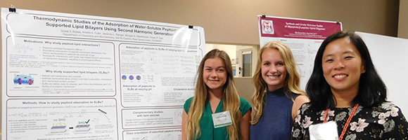 Grace Stokes and two of her research students